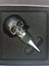 SKULL: Iron & Glory: Black skull wine stopper.