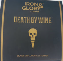 SKULL: Iron & Glory: Black skull wine stopper.